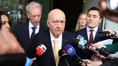 Sexual Assault Charges Against Leading Australian Broadcaster Reduced